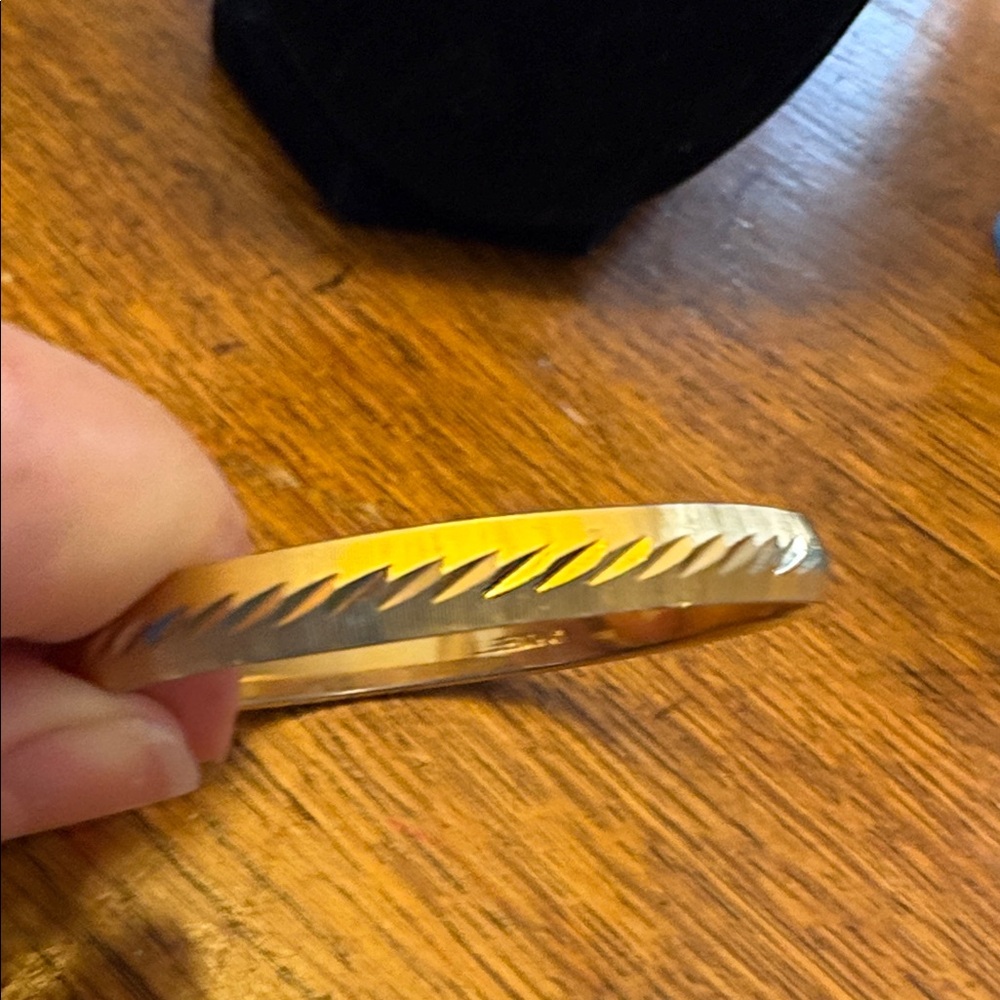 Brushed gold etched Monet bangle